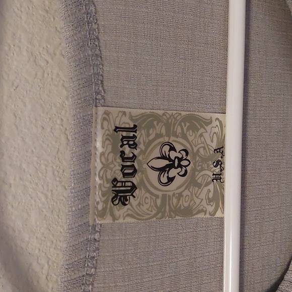 Vocal sleveless tank with studs and chain shoulder accent. - Picture 4 of 5